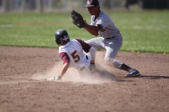 Tai Garcia hitting for O'Conell Boilermakers slides in to first base during the frosh/soph baseball game against Abraham lincoln high school. The Lincoln Mustangs won 10-5, Tuesday april 29th, photographed by Katie Sanders.